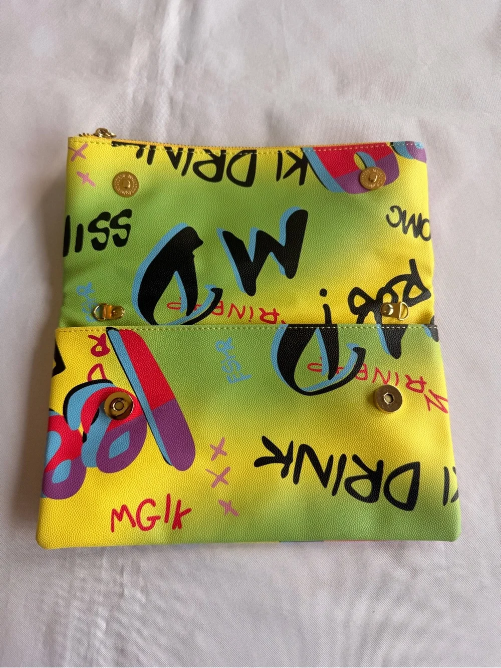 AKIRA Graffiti Multicolor Fold-Over Clutch Bold Letters Bright Yellow Interior
